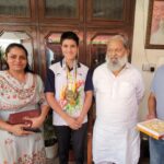 Haryana’s Energy and Transport Minister Anil Vij honors boxer Harnur Kaur from Shahpur with a medal for winning bronze in the Khelo India Boxing Compitition